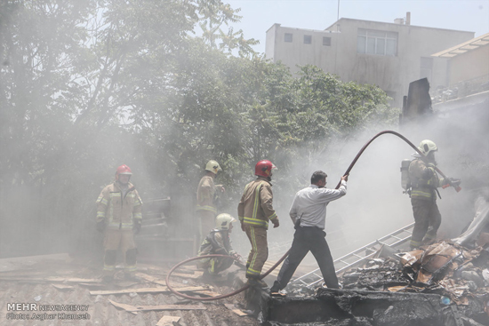 آتش سوزی در انبار کالا در میدان بهارستان