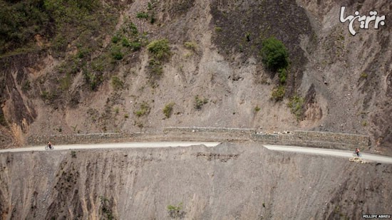 عکس: دوچرخه‌سواری در «جاده مرگ» بولیوی