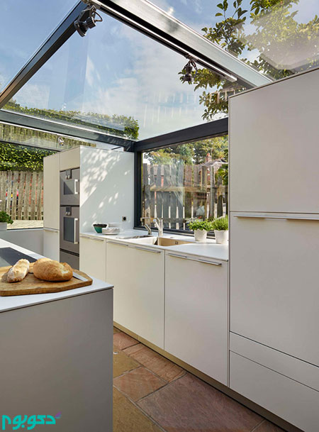 طراحی آشپزخانه شیشه‌ای بر روی بام