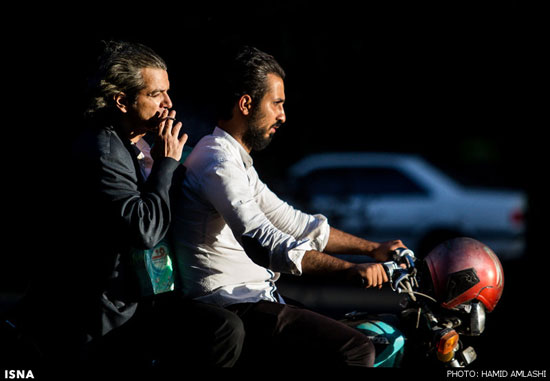 عکس: زندگی روی دو چرخ در تهران