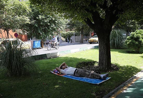 گرمترین روز سال در تهران +عکس